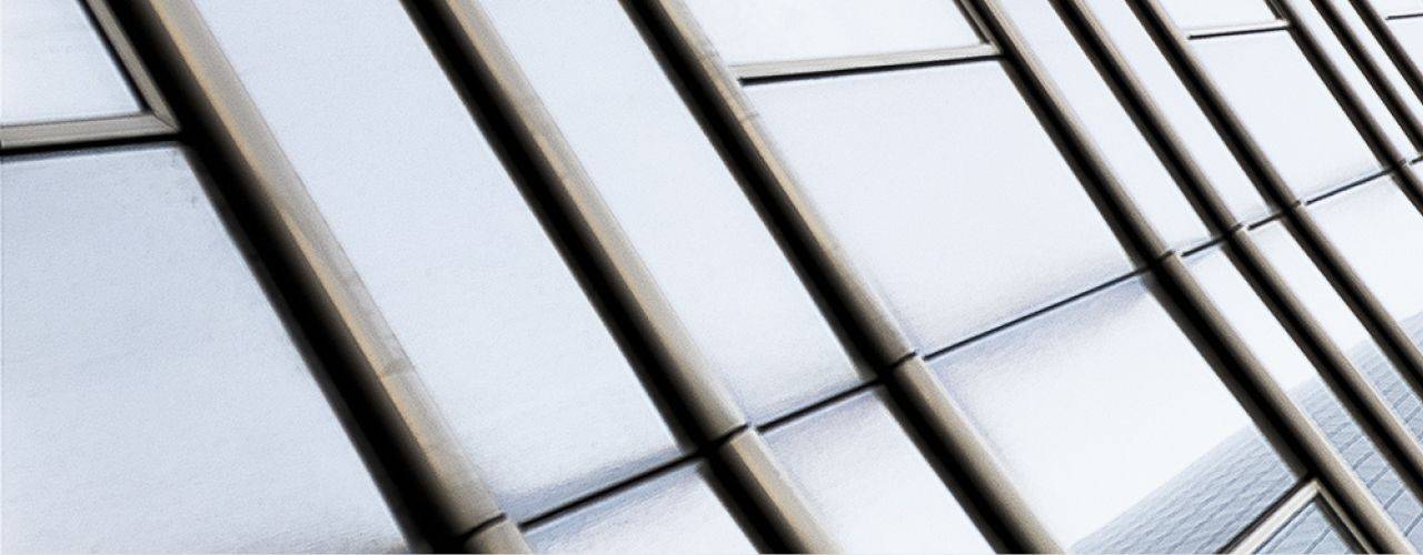 Decorative image of glass building front